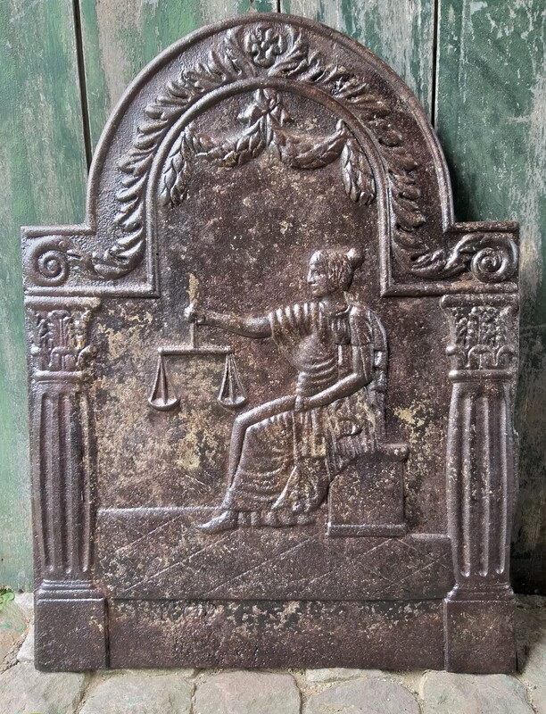 Backfire (or Backsplash) depicting Lady Justice