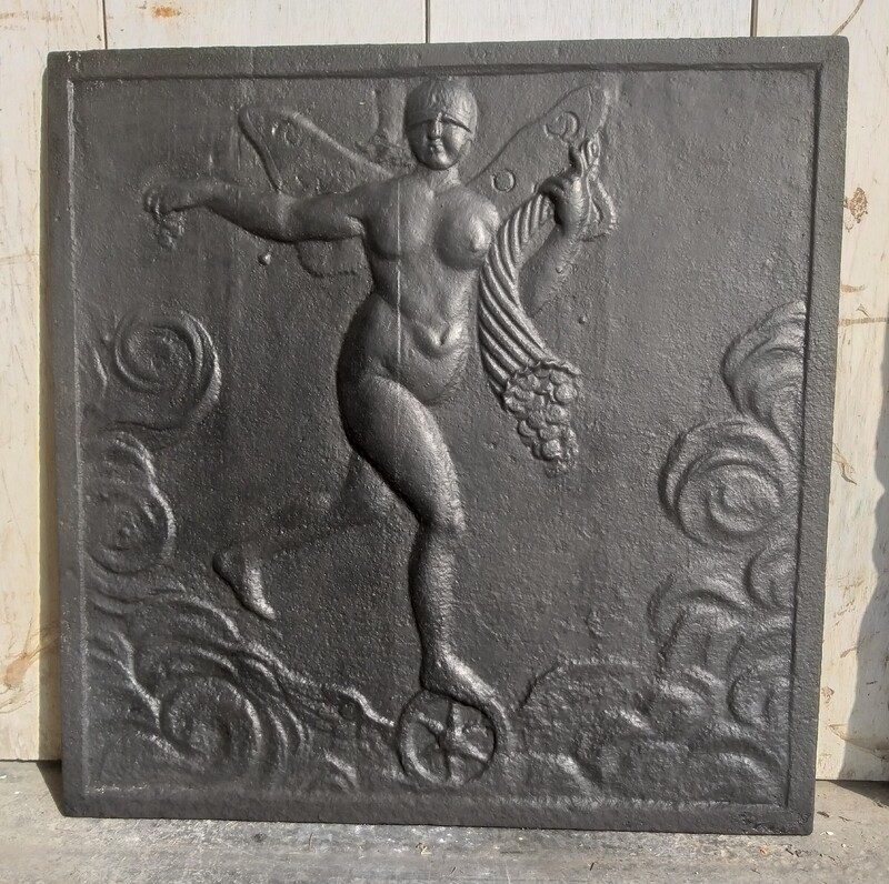 Fireback in cast iron, depicting Nike in Art Déco style